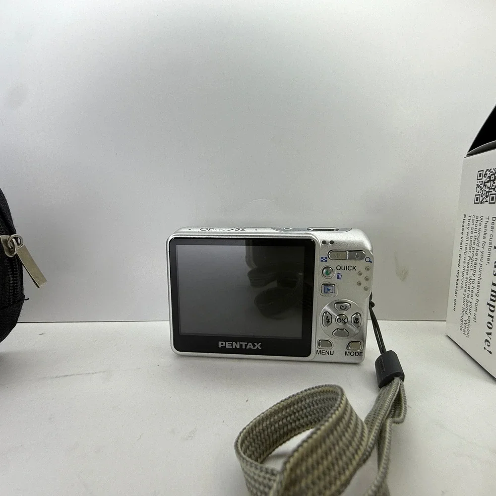 Pentax Optio S5z Silver Digital Camera 5.0MP 3x Zoom Bundle with Charger Case